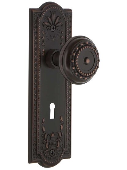 Meadows Design Mortise Lock Set With Matching Knobs in Timeless Bronze.